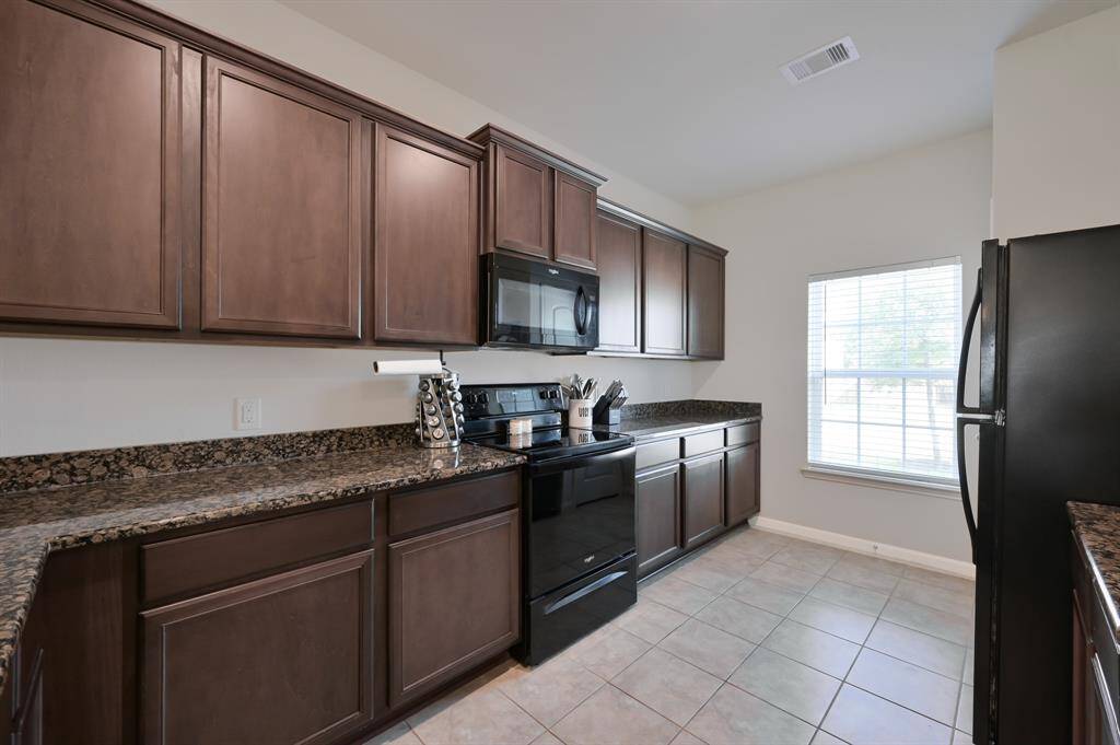 Kitchen View with the Oven and Stove
