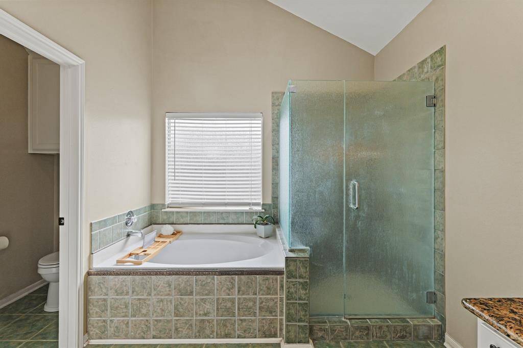 Primary Bathroom Shower with Rain glass; Separate Tub