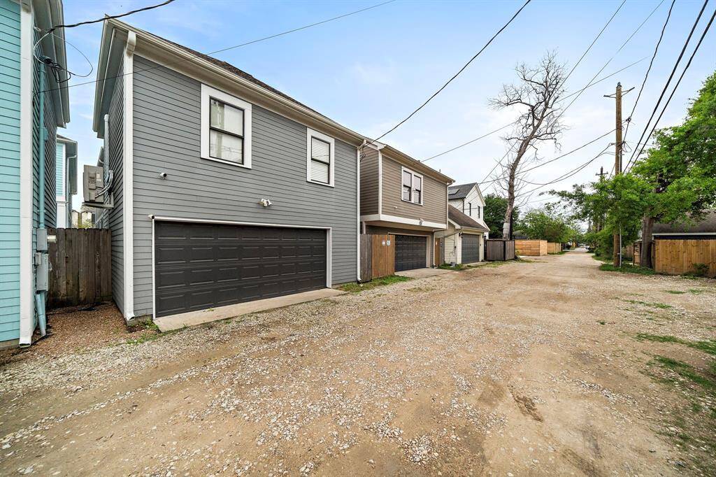 Another view of the garage with alley access, providing easy and private entry for convenience and extra parking. Thanks so much for visiting—come see it in person!