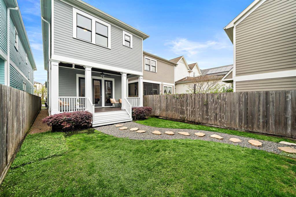 Wait until you see this yard! The possibilities are endless—add a pool, a garden, or create your own private retreat. Beautifully landscaped with a covered sitting area, perfect for entertaining!
