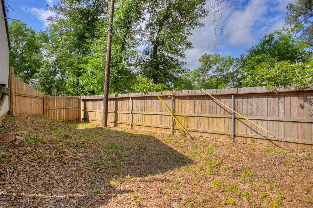 Separate fenced area behind the Workshop