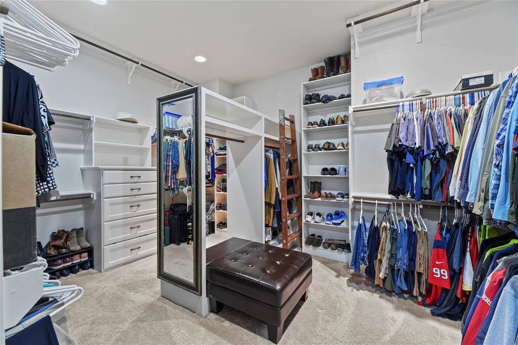 Amazing primary closet with built-ins.