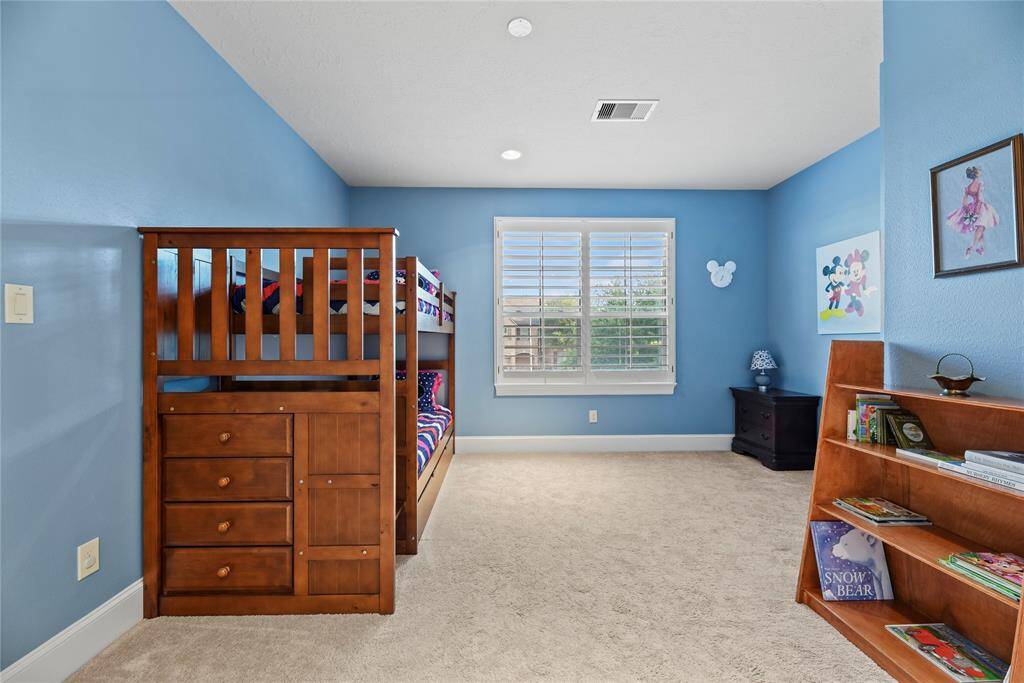 Second upstairs bedroom with an en-suite bathroom.
