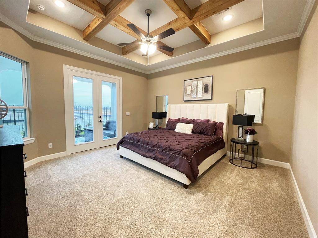 Discover the epitome of luxury and tranquility in the Portico's primary bedroom at Winfrey Estates. This elegant retreat features spacious interiors, exquisite finishes, and a serene ambiance, providing the perfect sanctuary for rest and relaxation. *Image depicts similar floorplan in the community.