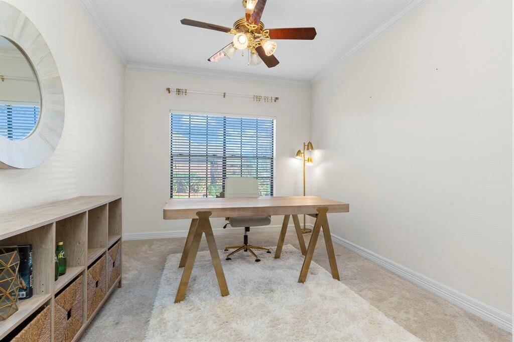 Home Office is spacious and offers a ton of natural light
