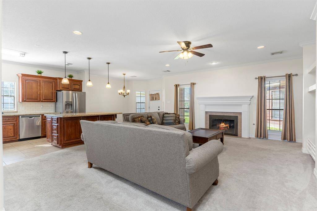 The fireplace compliments the cozy family room