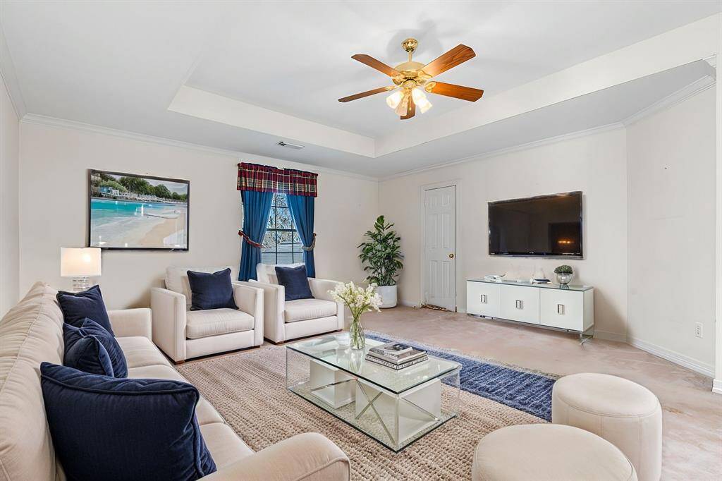 Photo of gameroom has has been virtually staged to illustrate the home's potential