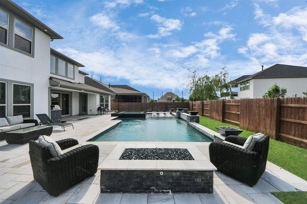 Relax by the fire pit or take a dip in the pool on a hot summer day.