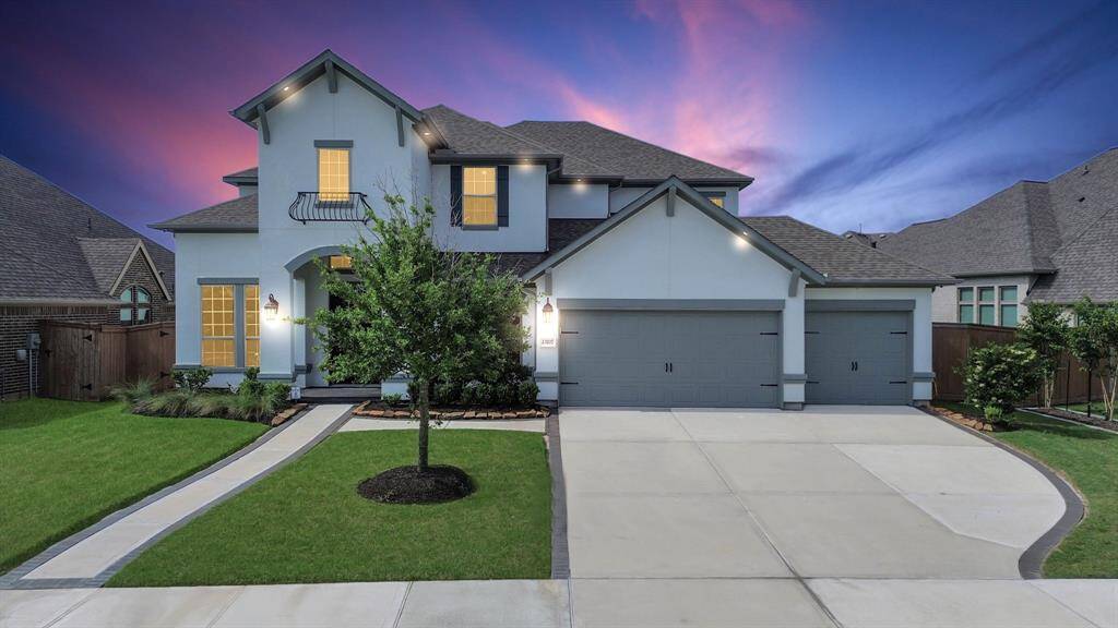 Step into the backyard oasis, with alarge covered patio, pool, and spa!