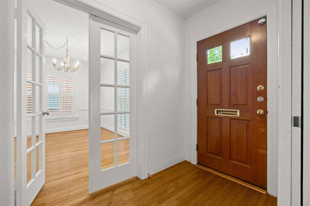 Foyer opening to Formal Dining