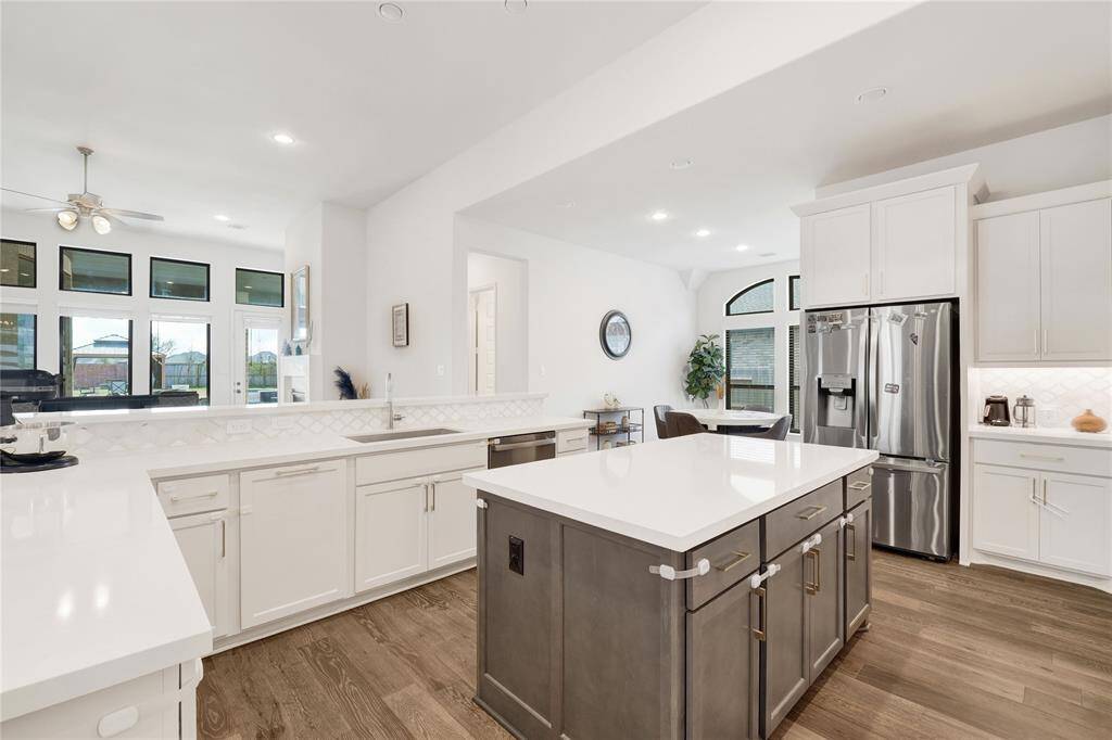 Another view of the kitchen facing the breakfast and living room.