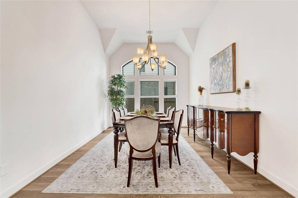 Specious dining room, with ample natural lighting.