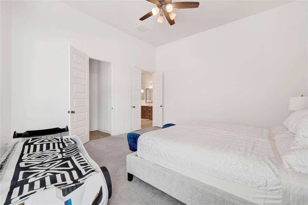 Another view of the primary bedroom.