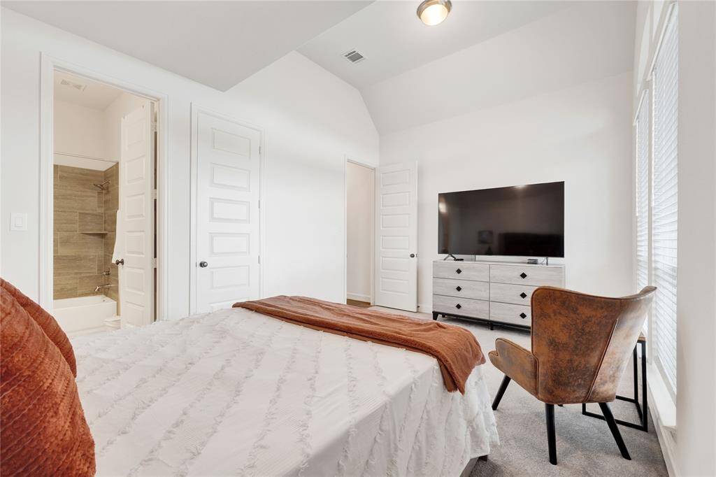 Another view of the second primary bedroom.