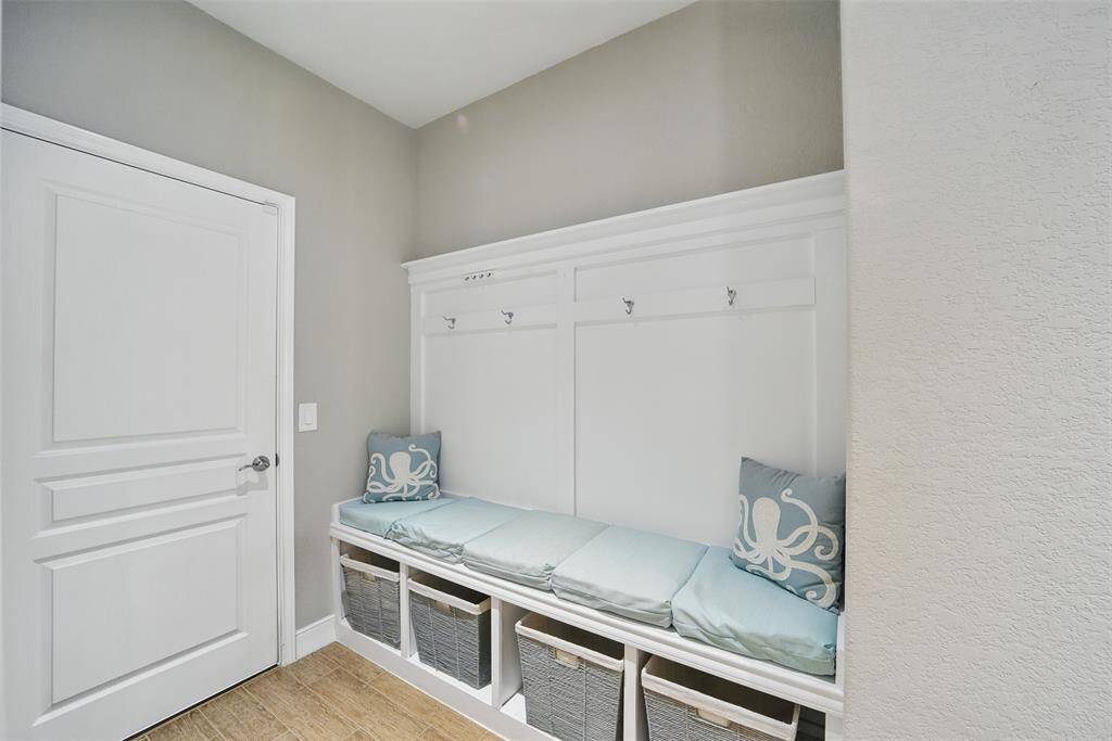 Mud room off the garage with built-in bench!