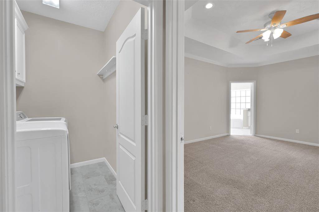 Utility Room just outside the Primary Suite