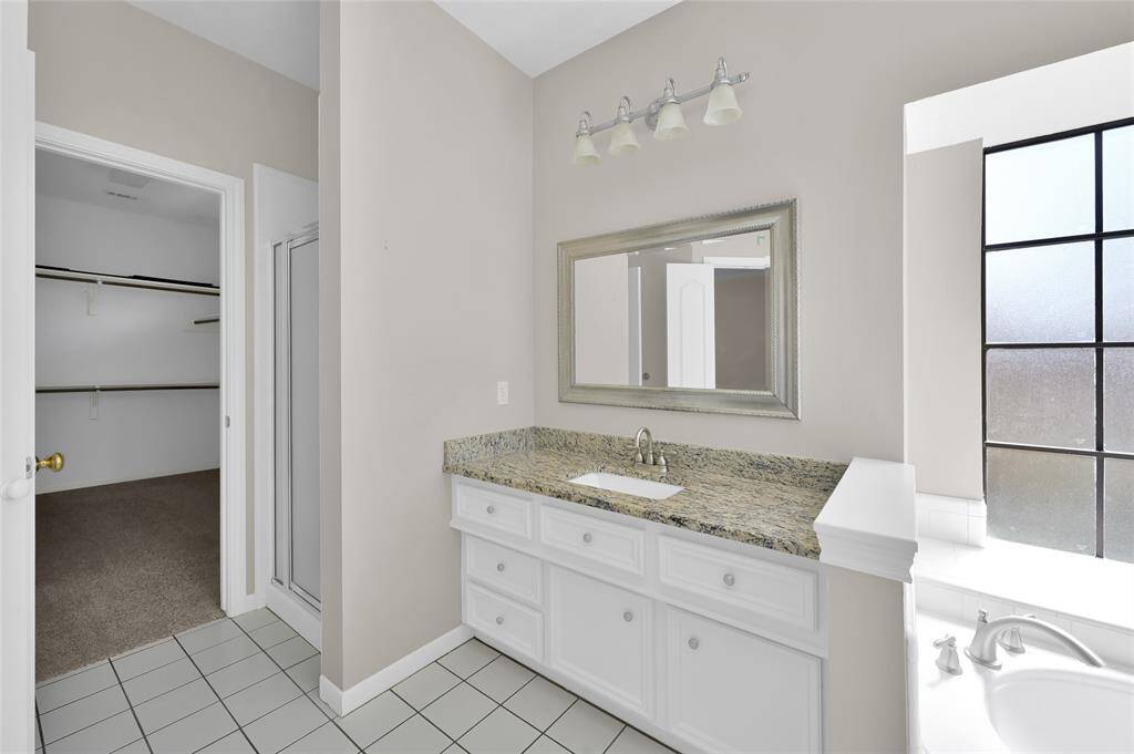 1 of 2 sink vanities and 2nd walk-in closet