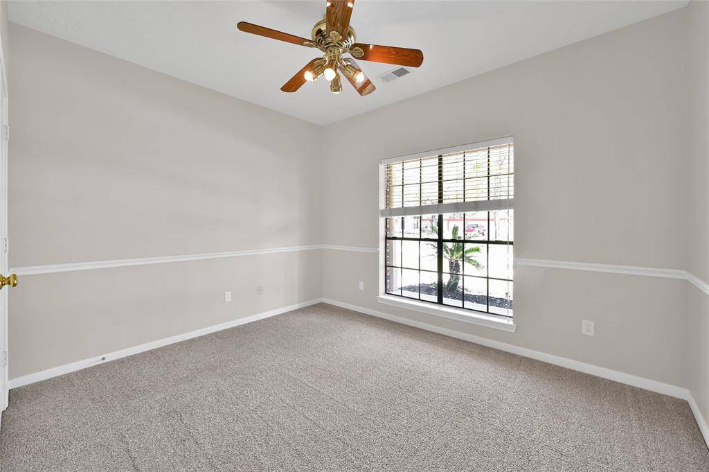 Secondary Bedroom #1 with double door closet