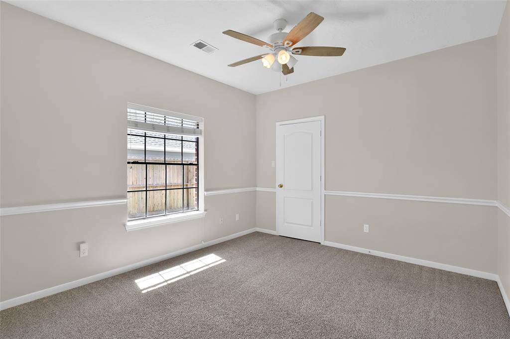 Secondary Bedroom #2 with small walk-in closet