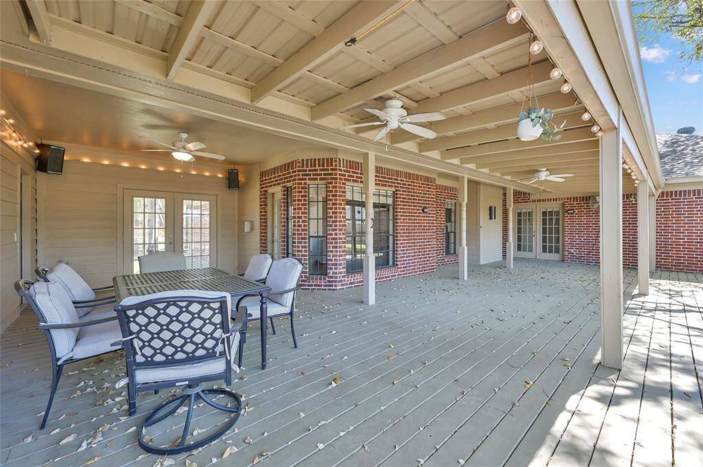 Fantastic covered patio with multiple entertaining areas.