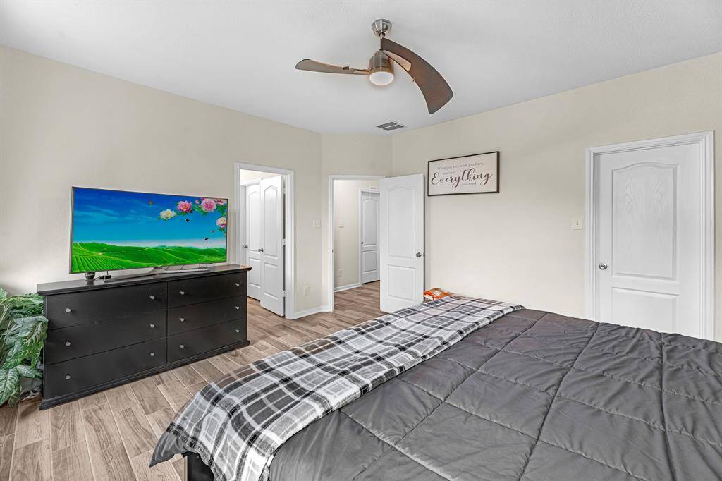 The primary boasts an en-suite bath as well as a large walk-in closet!