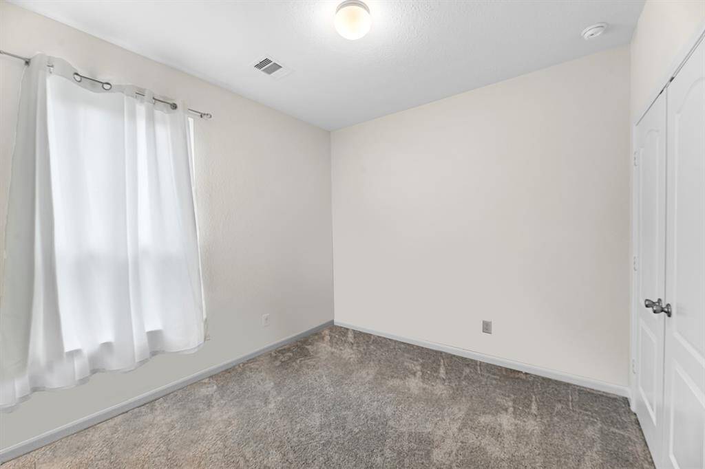 The first of the secondary bedrooms.