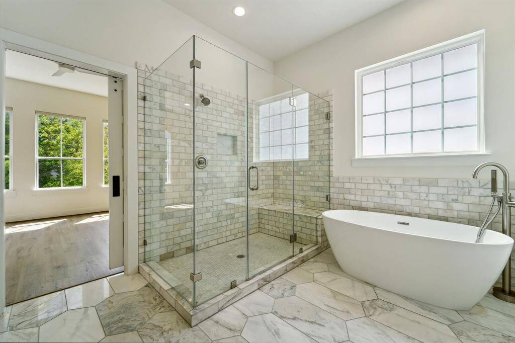 Free standing tub below frosted window!