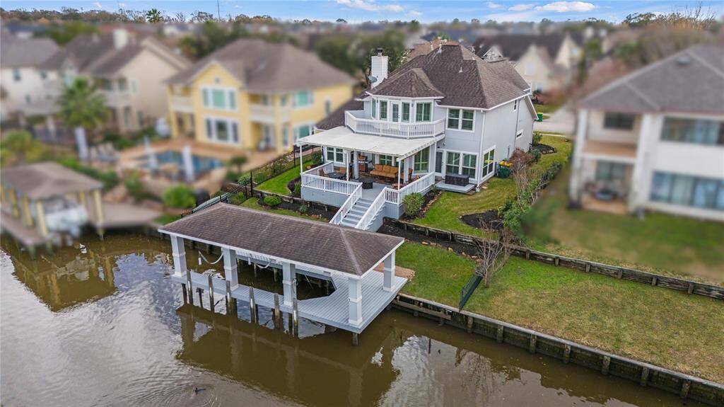 WELCOME TO YOUR DREAM HOME! This gorgeous custom built beauty is nestled on waterfront with easy access to Clear Lake!