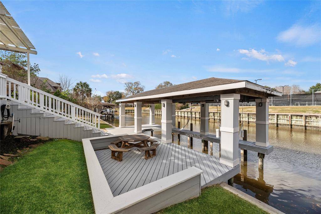 Freshly painted boathouse is equipped with private boat slip and boat lift!