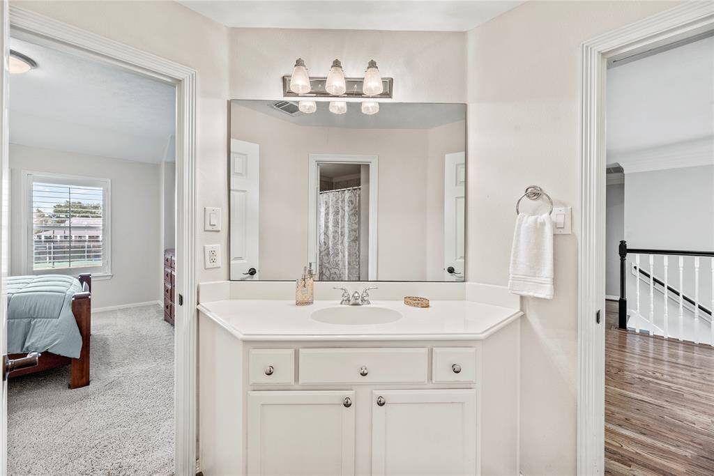 This clean and attractive space is perfect for family and guests alike. A vanity provides room for all the essentials.