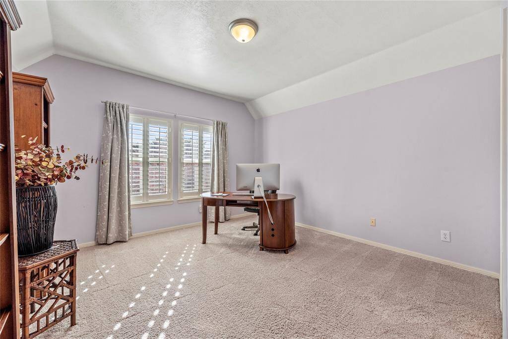 Retire to this charming bedroom and enjoy a quiet, delightful space all your own.