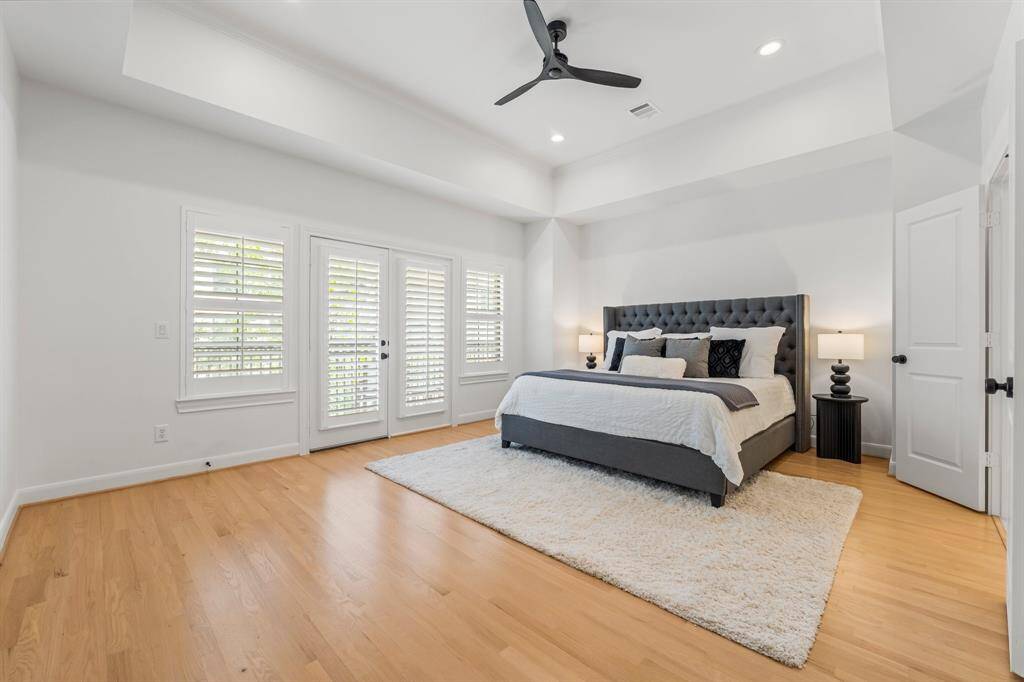 This generous master suite is a true retreat with a private balcony and his and hers closets.