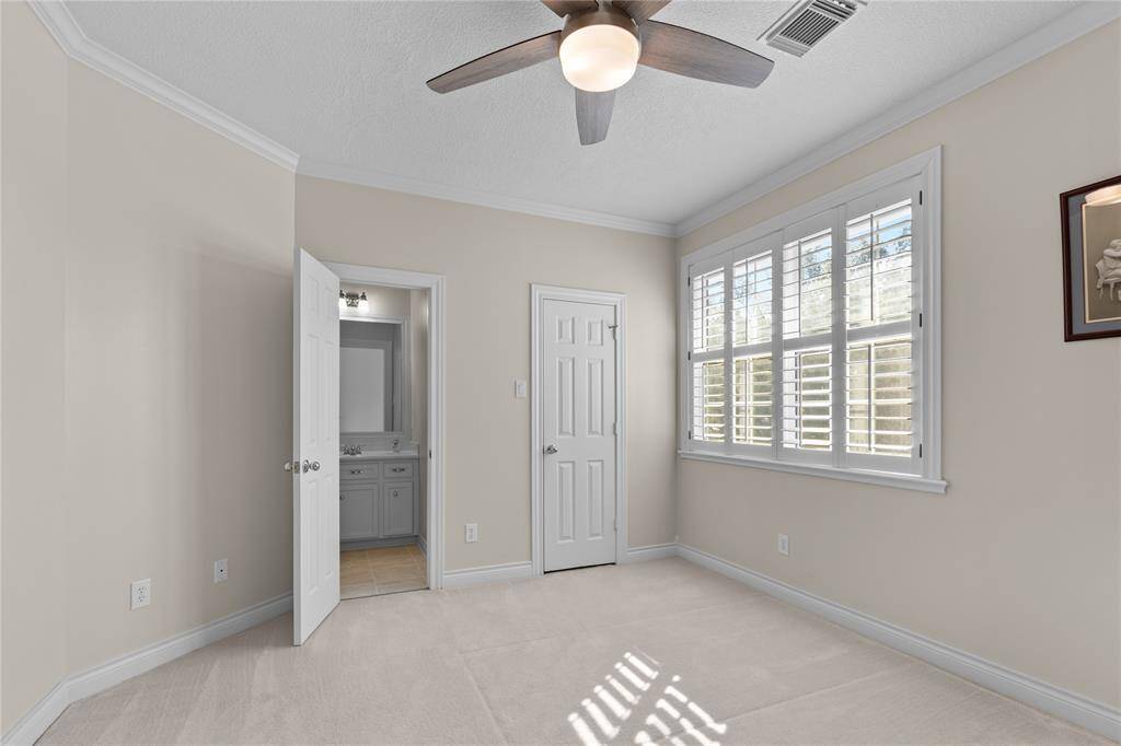 The 3rd bedroom also has a large plantation shutters windows perfect for a variety of uses, such as a guess room, home office oe a cozy retreat.