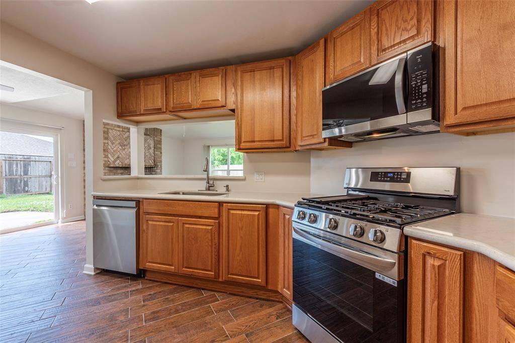 Another view of the dining area adjacent to the large kitchen.