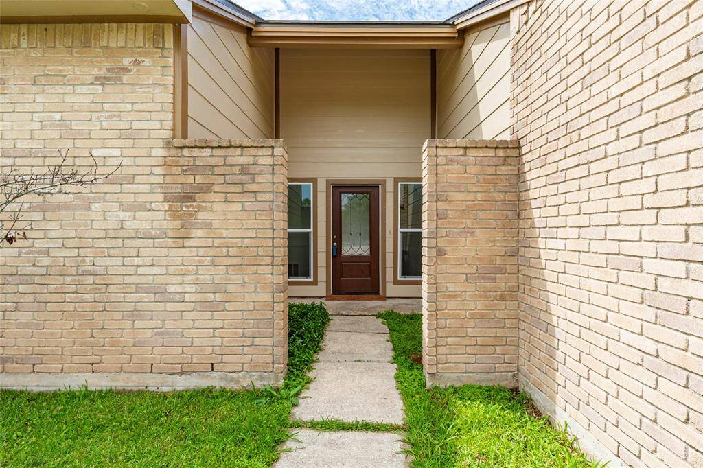 Walkway leading up to the front entryway of the home.
