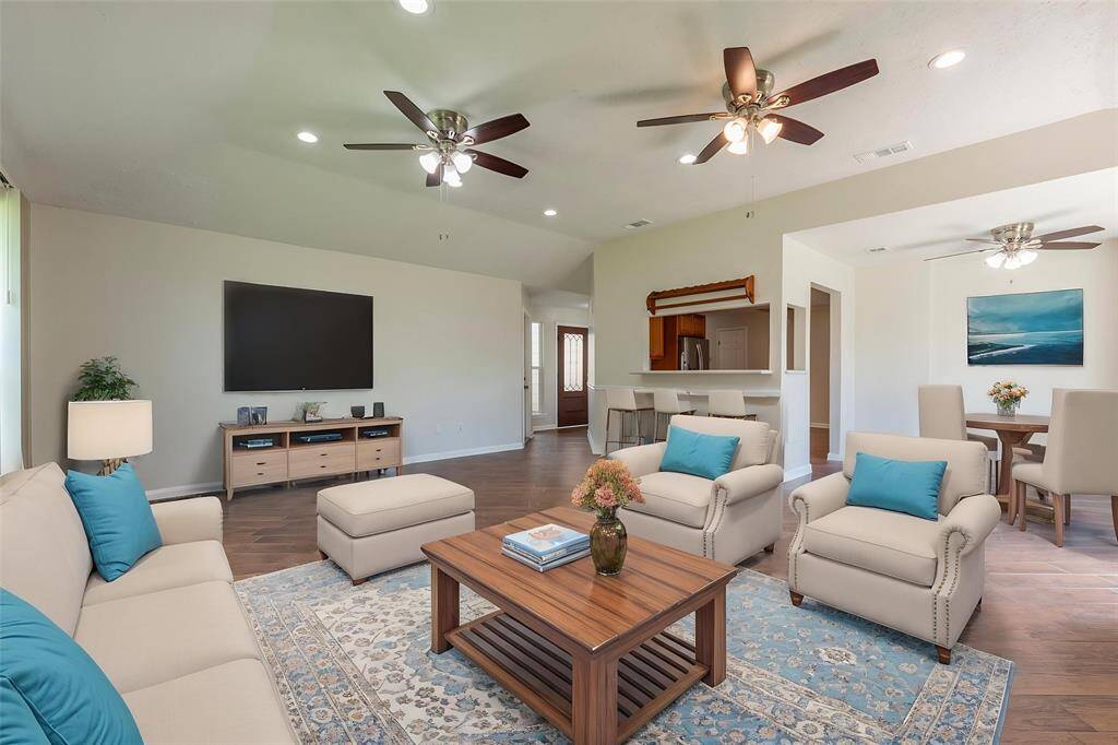 Virtually staged living room for an idea of the living space.