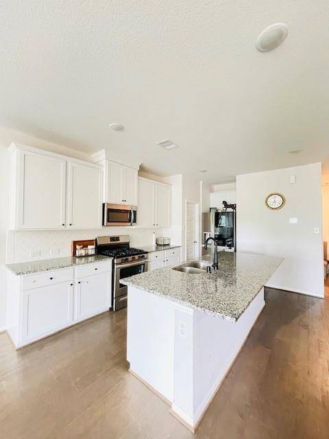The kitchen provides plenty of room for all of the cooks with stainless Appliances