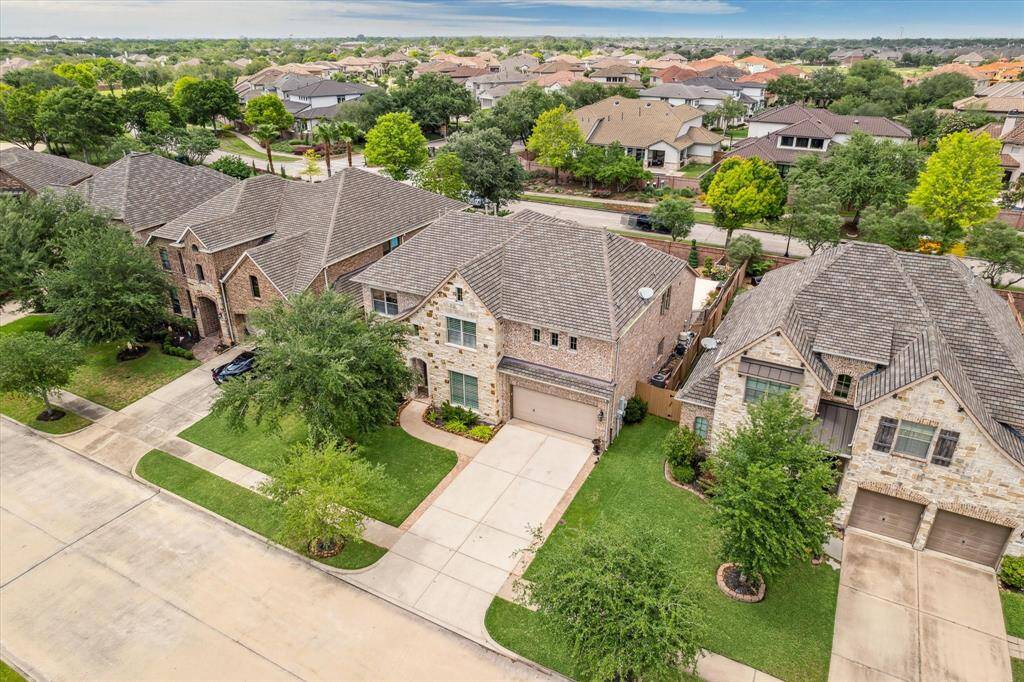 The expanded driveway offers added space for parking, making it convenient for larger vehicles.