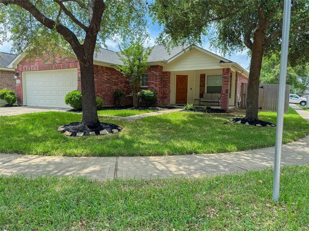 One story all brick 3bd/2bath/2 car garage home with EV charger and large covered porch.