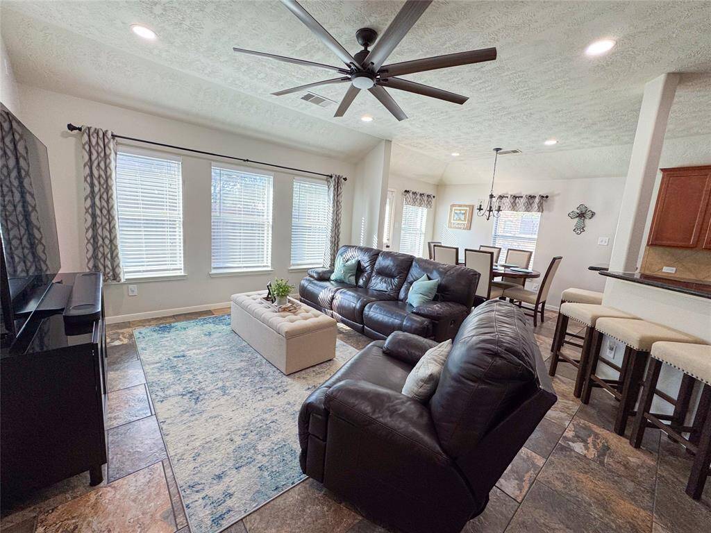 Spacious living room open to the breakfast room and kitchen.