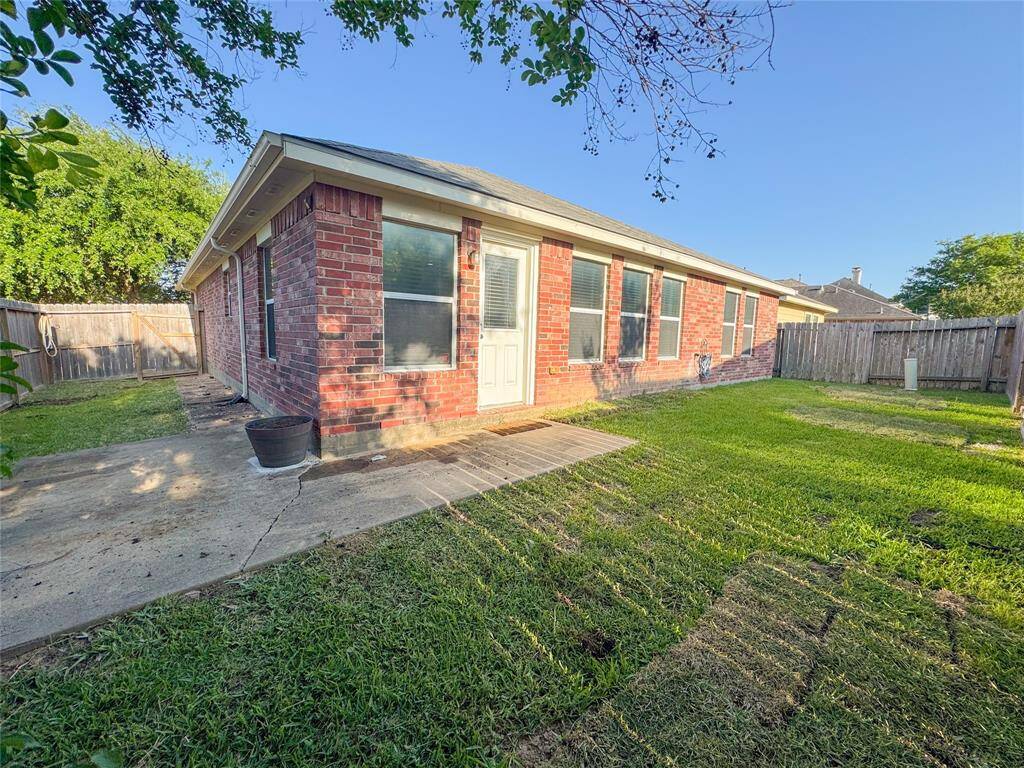 Corner lot with nice size patio and large crepe myrtle provides plenty of shade.