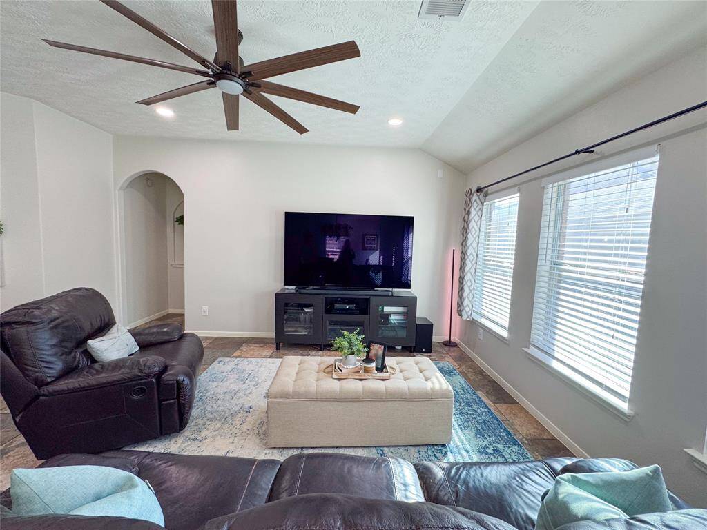 Primary suite is off the living room quietly tucked away at the back of the home.