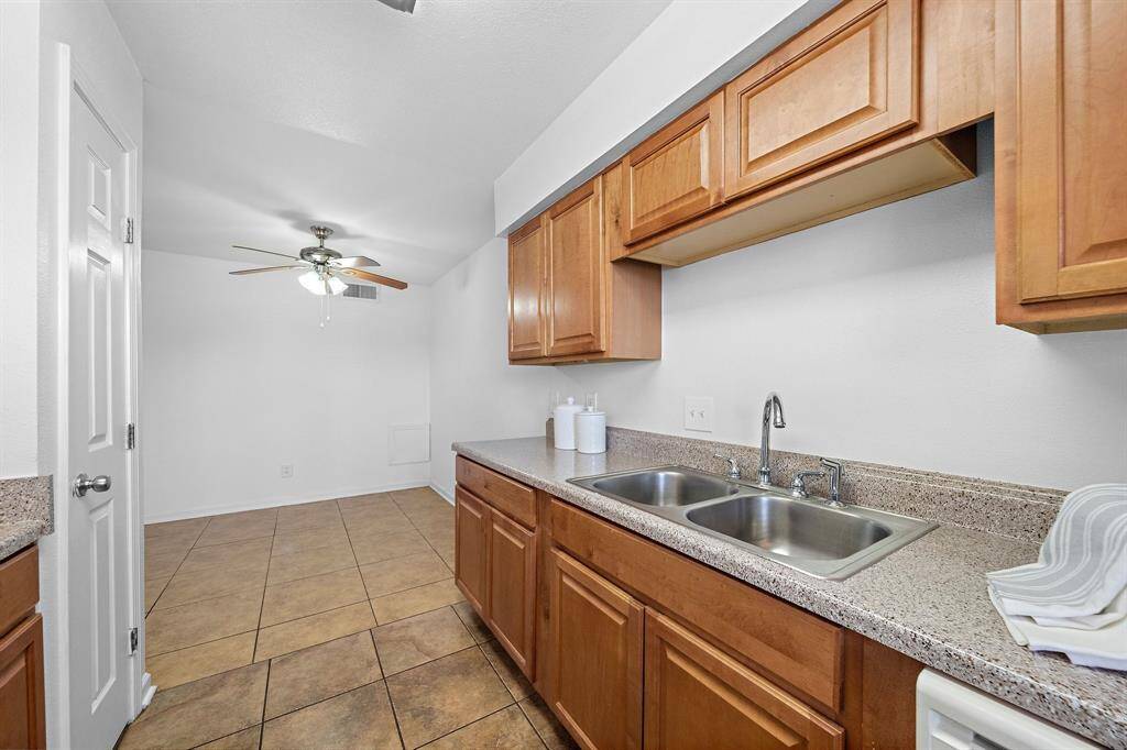 Another view of the dining and kitchen areas!