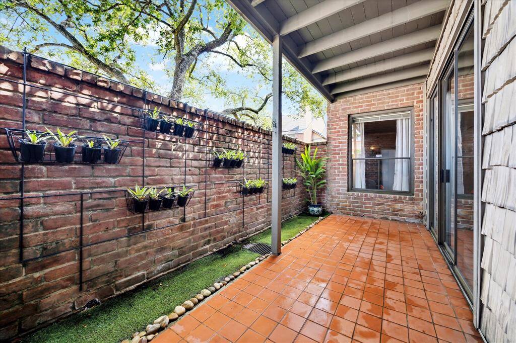 A completely priviate patio that can be viewed from the two bedrooms and the primary living space.  The perfect spot to relax and unwind or a space for your furry friends.