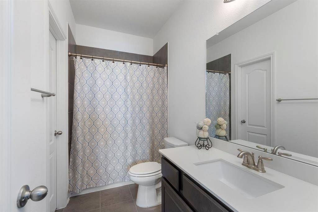One of the 3 1/2 baths in this home.