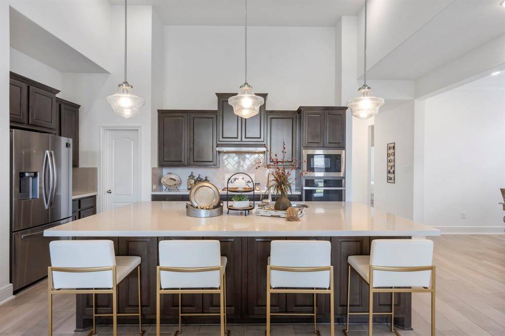 Stainless steel appliances with gas cooktop make this one special.