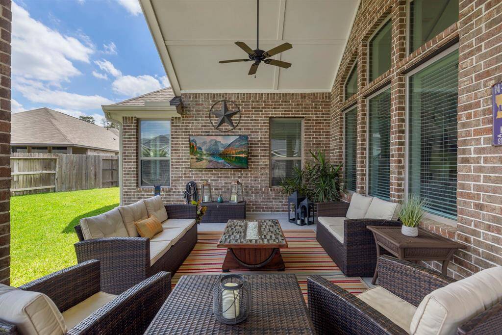 The outdoor patio is an entertainer's dream, featuring the expansive space which is perfect fo hosting guests or enjoying the fresh air.