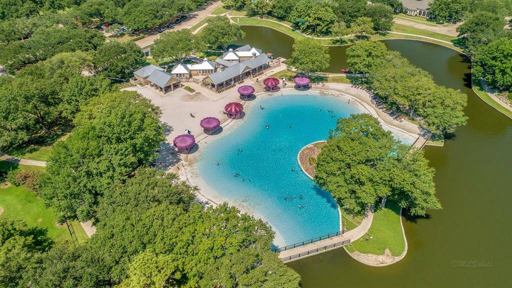 Cinco Ranch Beach Club is steps away from this Home