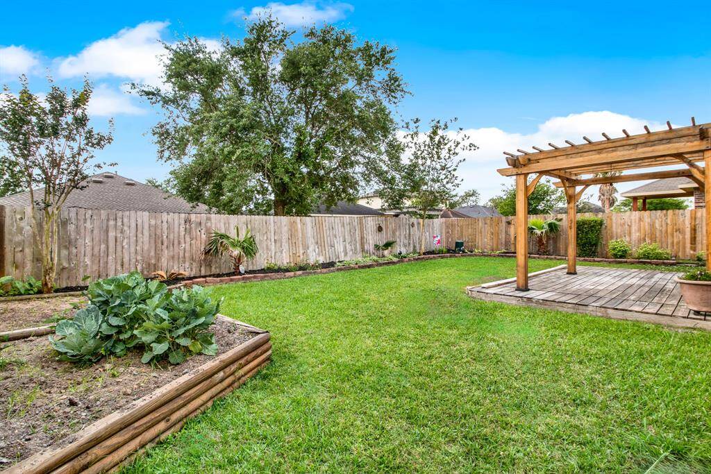 A dedicated garden area offers potential for cultivating vegetables and herbs.