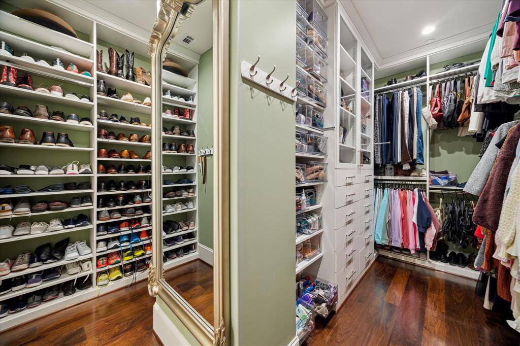 Custom built and spacious primary closet.